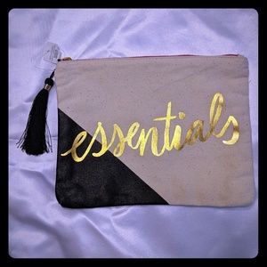 Medium Beige and black travel pouch